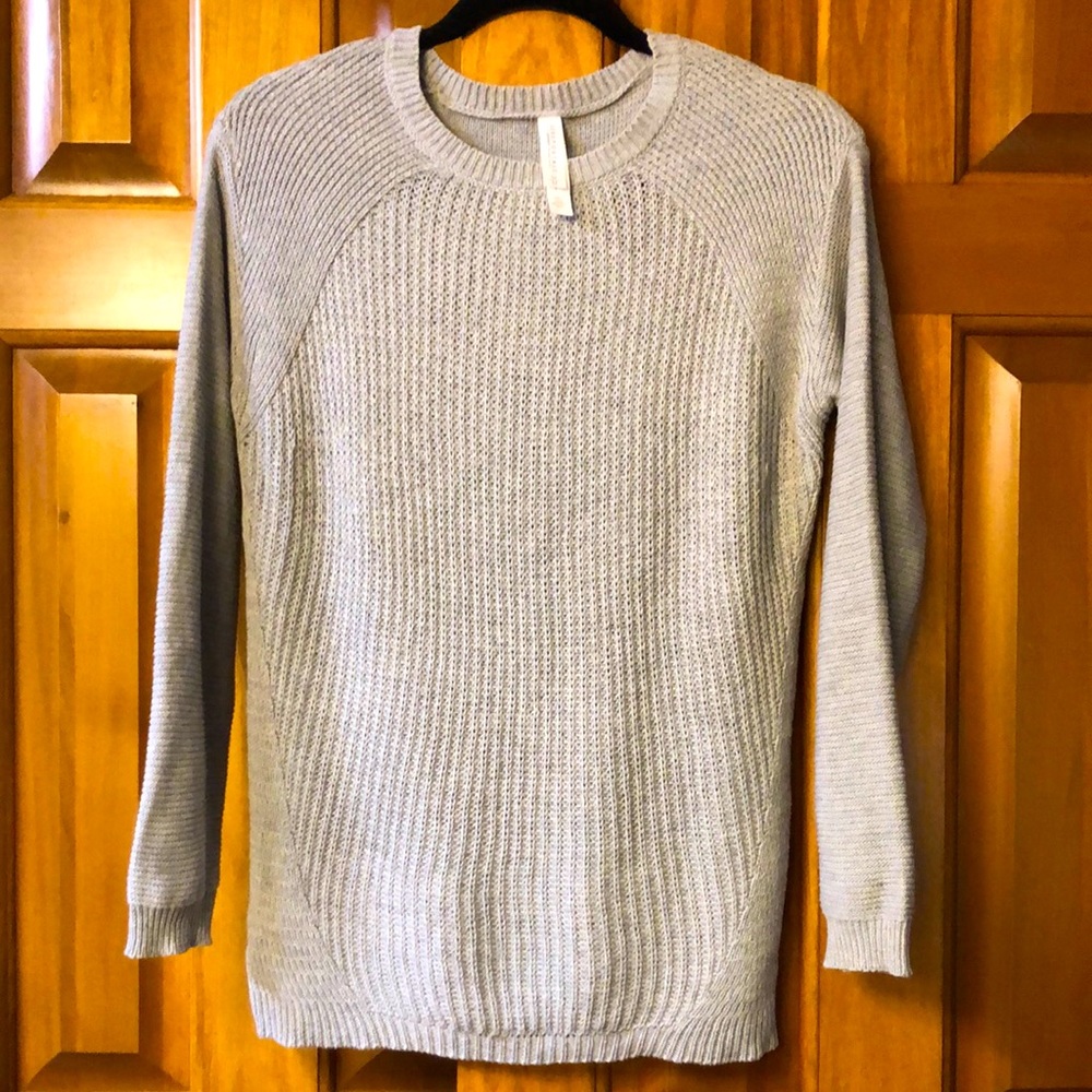 Gray/silver light sweater. Good condition
